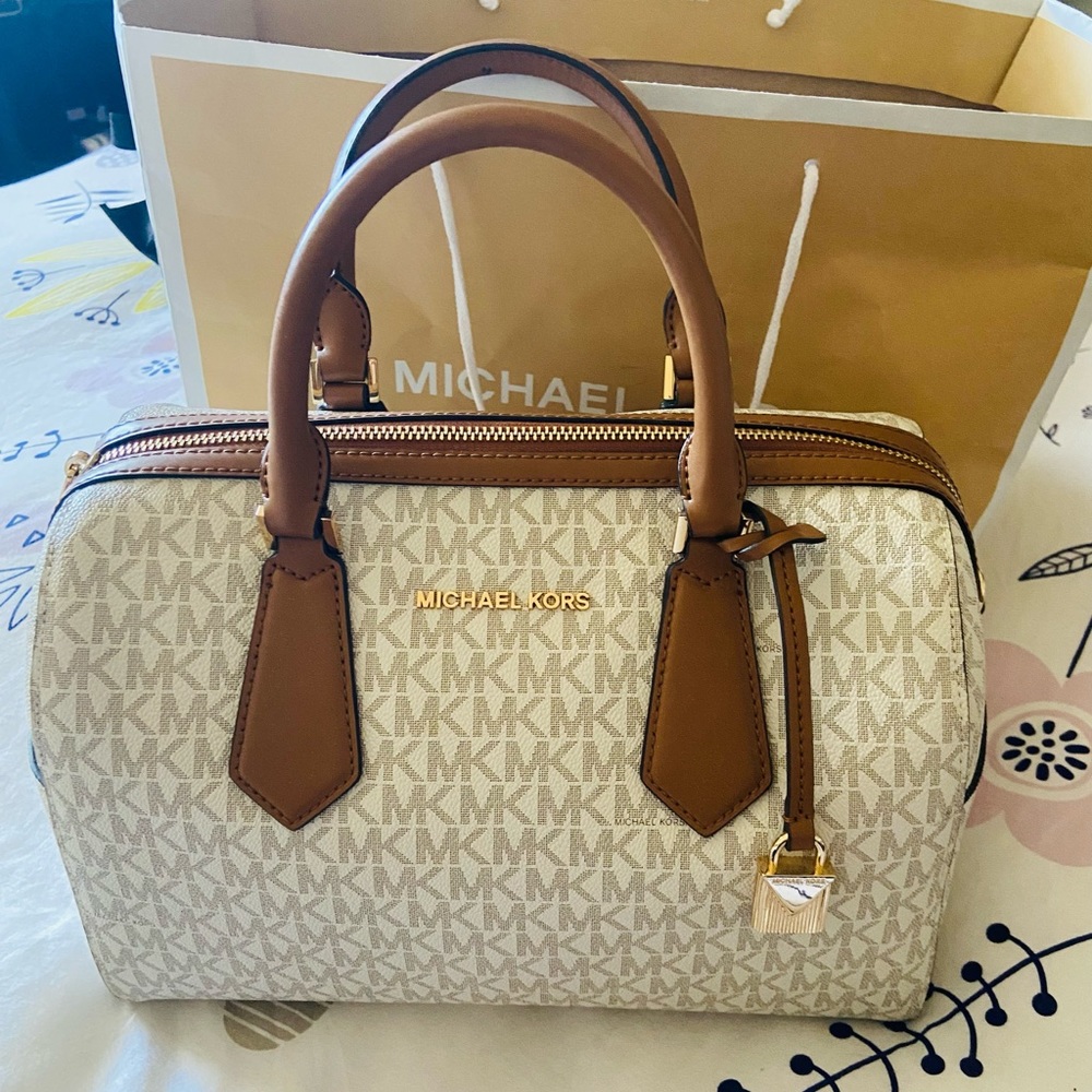 Michael Kors' Authentic Original Use one time only still Great Condition Medium!